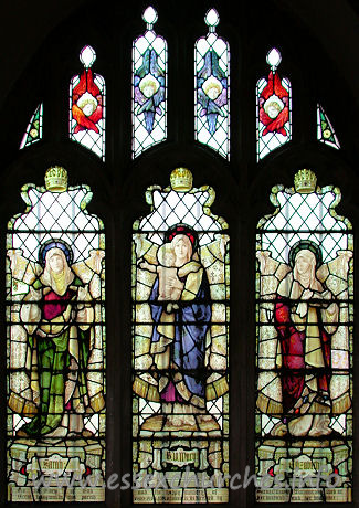 St Andrew, Hornchurch Church - This second, north aisle window is early 20th century, and is a memorial to Sarah Williams who lived at Great Langtons. It depicts St Sarah, The Virgin Mary and St Elizabeth and it was designed and made by Haydon Bacon of London.