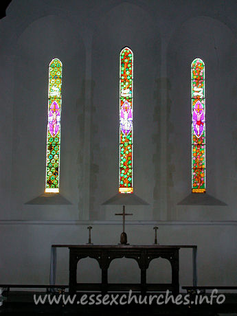 St Mary, Broxted Church - Original lancet windows and triptych reredos. 
The East window is by Francis Stephens.

