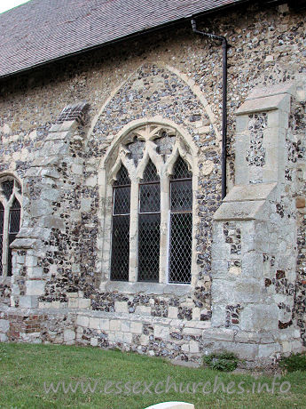 St Catherine, East Tilbury Church - A closer view of the blocked S arcade, now pierced with a 
decorated window.
