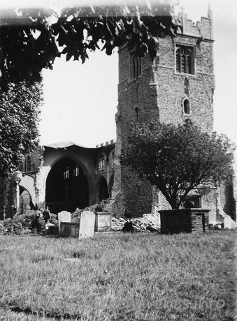 St Peter ad Vincula, Coggeshall Church - One of a series of 8 photos bought on eBay. Photographer unknown.
 
"The Belfry Tower" - dated September 1940.
 
On 16th September 1940, the church was bombed. The nave roof was destroyed, which pulled down some of the N wall and arcading with it. Part of the tower was also seriously damaged.