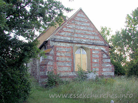 All Saints, Vange Church - ... however, on my first visit (2003), things looked rather different. Here, you can see the boarded up east window.\n
Unfortunately, Vange church was made redundant in the early 1990s. It was subjected to much vandalism and abuse in the intervening years. Shortly after my first visit, though, I was informed that the church had passed into the care of the Churches Conservation Trust, who were going to 'make safe' the building.\n
The architect for Vange church is Alan Greening, who has, in my opinion, done a splendid job of restoring this church to it's former glory.\n