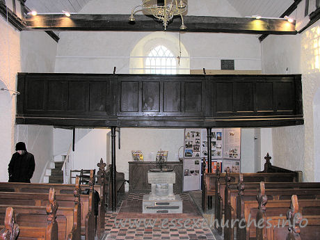 All Saints, Vange Church - A good view of the West end of the church, clearly showing the 
gallery and the original font below.
See more on churches with west galleries at:

http://www.westgallerychurches.com.