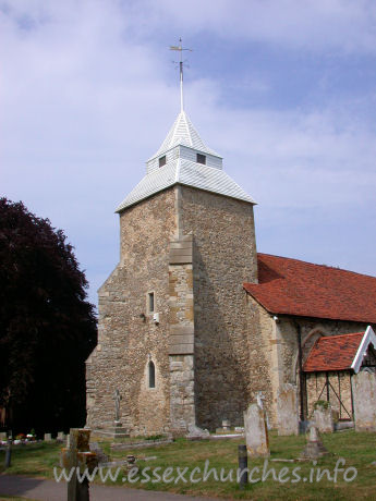 St Mary the Virgin, North Shoebury Church - This lower parts of the tower are C13, as is shown by the west 
windows. Later, the buttresses were added, and a two-step pyramid roof was 
added, the upper part broached.
