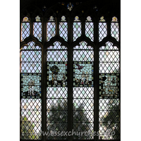 St John the Baptist, Thaxted Church - This stained glass window (and the following four enlargements of the panels within it) depicts Adam and Eve. The original glass in the panels dates from C15.