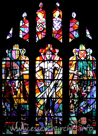 St Andrew, Hornchurch Church - Taken from the church's own website
The new window on the North side of the Church was installed in 1991 to commemorate the Six Hundredth Anniversary of the connection with New College Oxford. On the left is William of Wykeham in 1391 receiving a document from Richard II allowing him to purchase the lands of the Monks of Montjeux in Havering to endow his new College of St. Mary in Oxford. In it the Church is described as the Parish Church of Havering commonly called the Horned Church. Beneath the figures are the Towers of New College and of the Parish Church. On the right is shown the Parish of 1991 with figures depicting worship outreach and pastoral care covering all ages and the cooperation of men and women and clergy and laity. This activity is shown in the local setting of recent history symbolised by a Spitfire representing the important role of Hornchurch R.A.F. Station in the Battle of Britain and local industry represented by a Ford Fiesta and an Amstrad Computer. Beneath the figures are the daughter churches of St George and St Matthew.