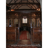 St Edmund, Abbess Roding Church - This view of the nave, looking W from the chancel shows the nave roof tie beams, which are supported on arched braces.
