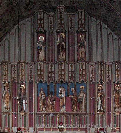 St Alban, Westcliff-on-Sea Church - 


The East Wall, behind the High Altar, is the Westcliff World 
War One War Memorial. 
The figures, from top to bottom, left to right, are: 
The Virgin Mary, Jesus, St. Alban 
St. David, St. George, The Magi, Virgin and Child, St. Andrew, 
St. Patrick.



