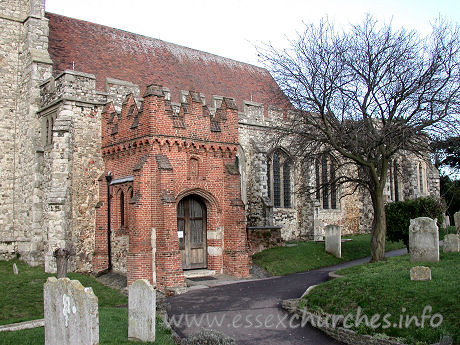Holy Trinity, Rayleigh Church - 


This brick porch conceals a C13 South doorway. The porch 
itself has two-light brick side windows, and is crowned with stepped battlements 
upon a trefoil-arched corbel frieze.


