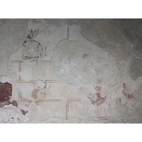 St Mary, Mundon Church - This is the earliest scheme of wall painting, and has recently been identified as the Martyrdom of St Edmund, King of East Anglia by Professor David Park, Courtauld Institute of Art, Conservation of Wall Paintings Department. He is crowned and the Danes are shooting arrows at him from in front and behind. === Only the head and shoulders of the Edmund figure, in three-quarter profile, remain, outlined in red, with his hair painted red and his eyes painted black. Behind the saint are vestiges of a bow, hand and arrow: the bow outlined in black; the arrow and hand in red. Facing him are the remains of two hooded figures in profile, the nearest is shooting another arrow: this and the figures are outlined in black; their hoods are red. === Above the Edmund figure is an unidentifiable figure outlined in black.



