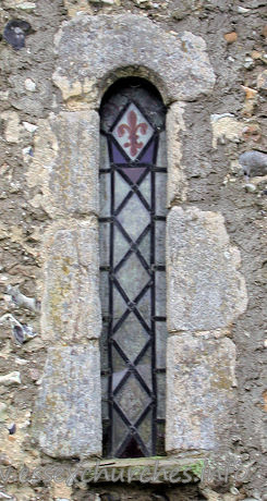 Dedication Unknown, Mashbury Church - One of two Norman windows in the north wall.
