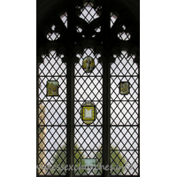 St Nicholas, Elmdon Church - The 17th century painted glass in this window was removed from St Dunstan's Church, Wenden Lofts, during demolition of that church. A.D. 1958.